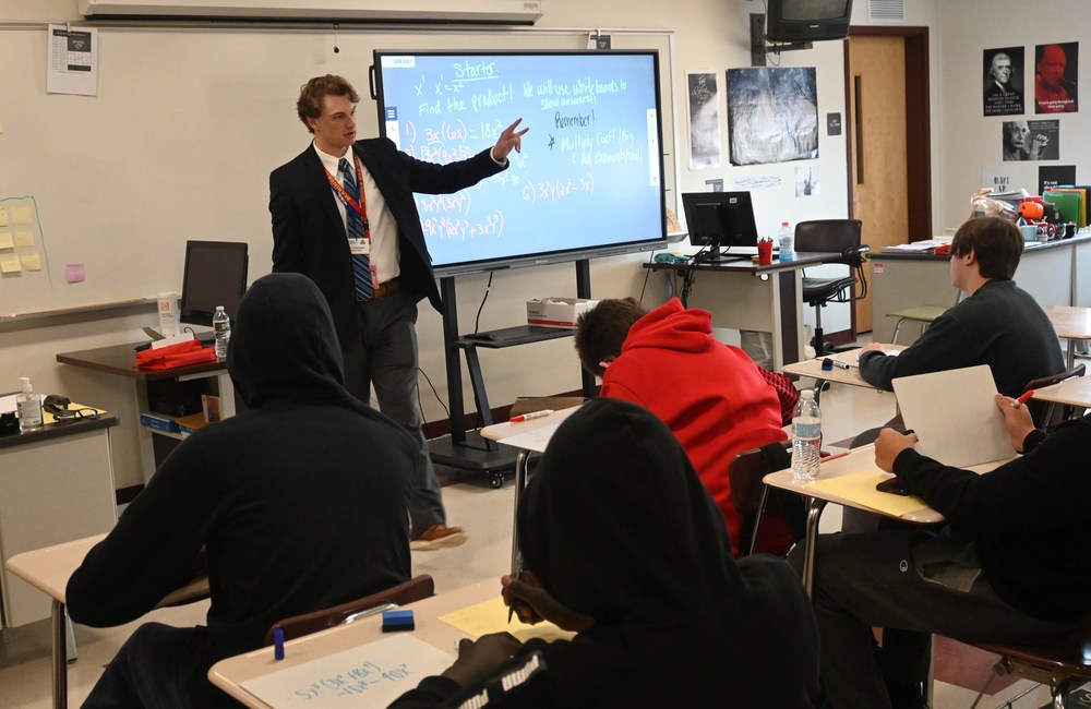 Zach Gitschier leads a class at Memorial High School. Zach is a participant in the Manchester Excels program and is earning a master's in secondary education.