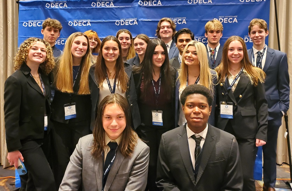 Central students pose for a photo at the 2023 DECA New Hampshire competition