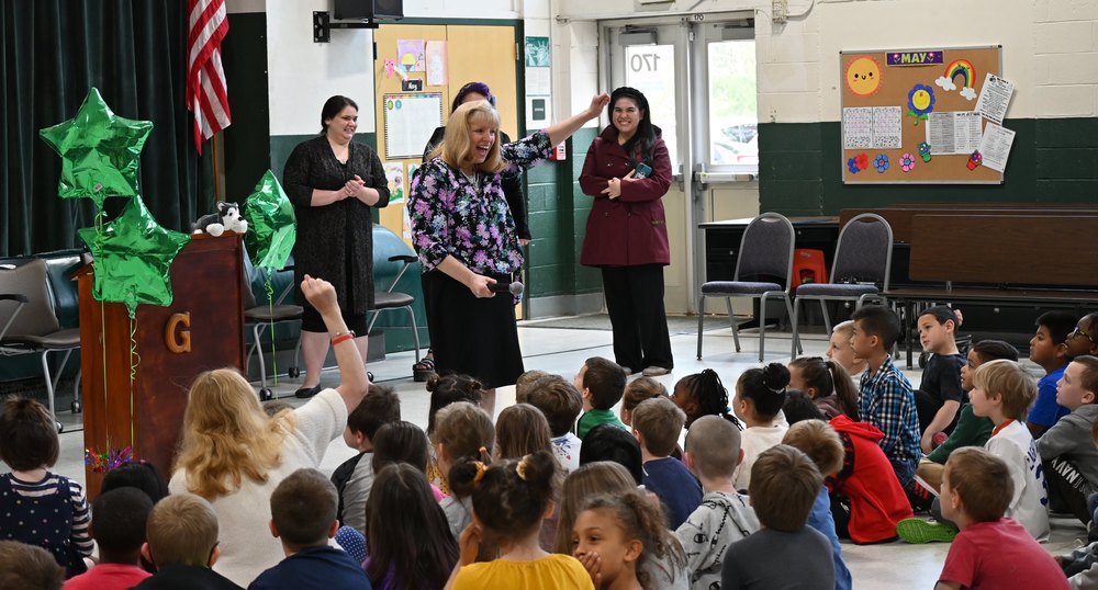 students and principal at Highland Goffe's Falls Elementary celebrate being named school of the year