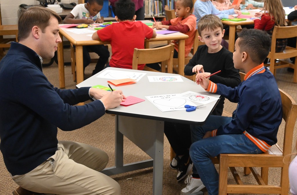students at Smyth Road elementary make valentines with Congressman Chris Pappas