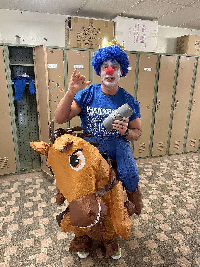 McDonough Principal DiBenedetto had to dress up as a rodeo clown for a dance party with students as part of the school change drive
