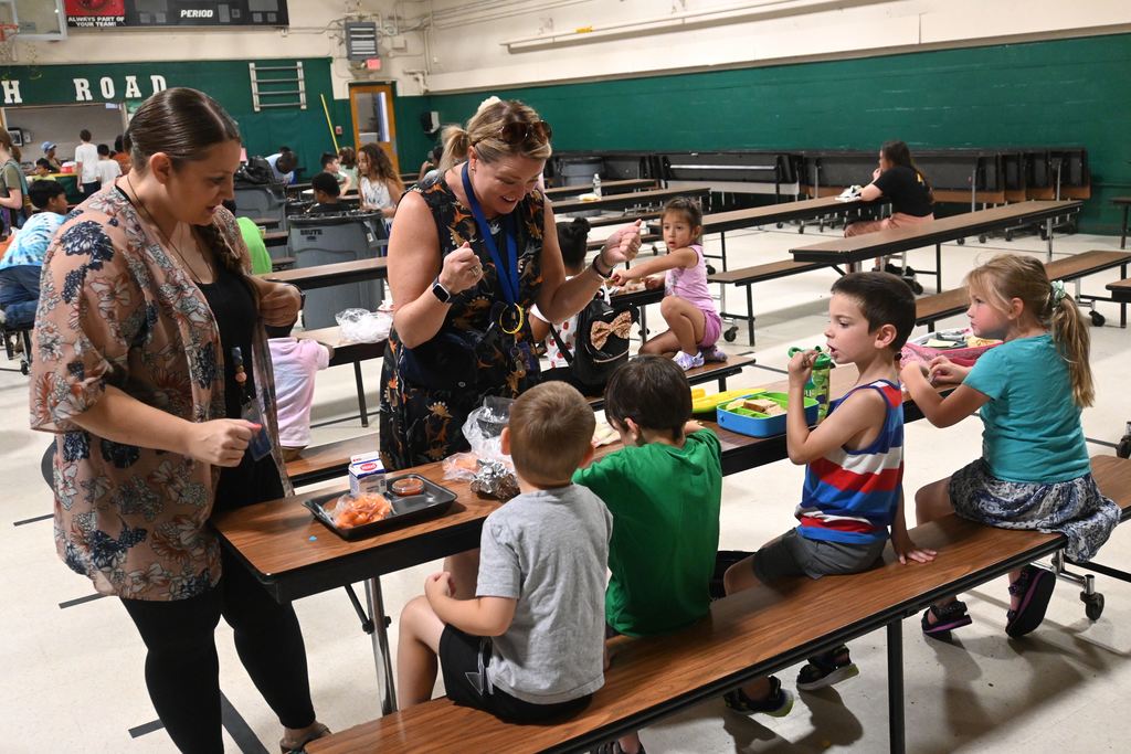 students in Blast Off to Kindergarten program eat lunch in the cafeteria
